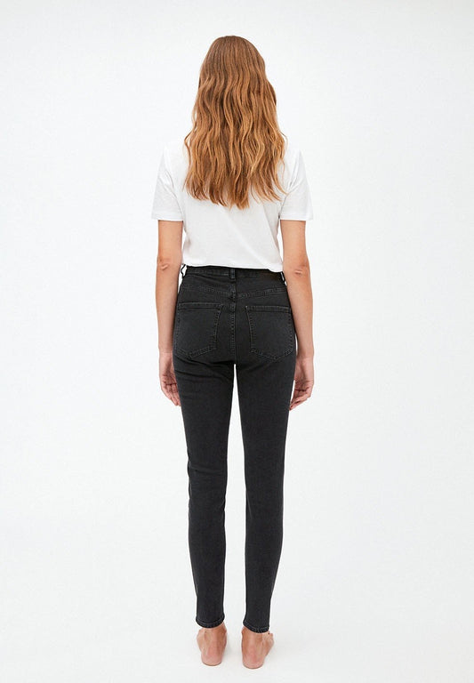 Skinny jeans from Armedangels. Full length slim leg, zipper closure , side and back pockets. Made from sustainable organic cotton with a little bit of elastane for extra comfort. In a washed down black colour.
