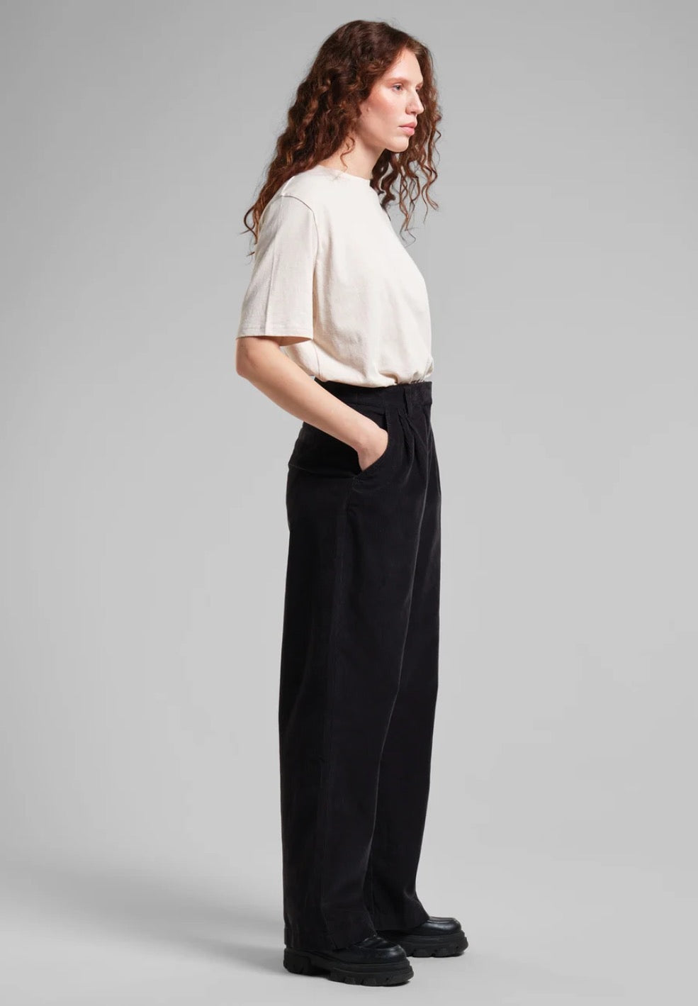 Vickleby wide leg corduroy trousers from Dedicated sustainably made from organic cotton. With a zipper closure, a high waist and side pockets. In black.