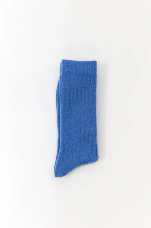 Bright blue wool blend socks from the Spanish brand Suite13Lab. Made from 70% merino wool, 27% polyamide, 3% elastomer. Made in Spain.
