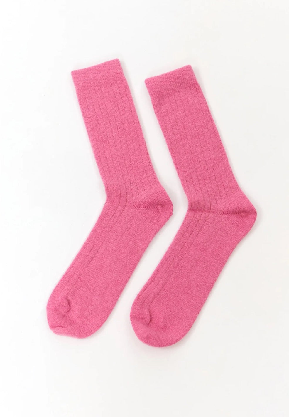 Pink wool blend socks from the Spanish brand Suite13Lab. Made from 70% merino wool, 27% polyamide, 3% elastomer. Made in Spain.