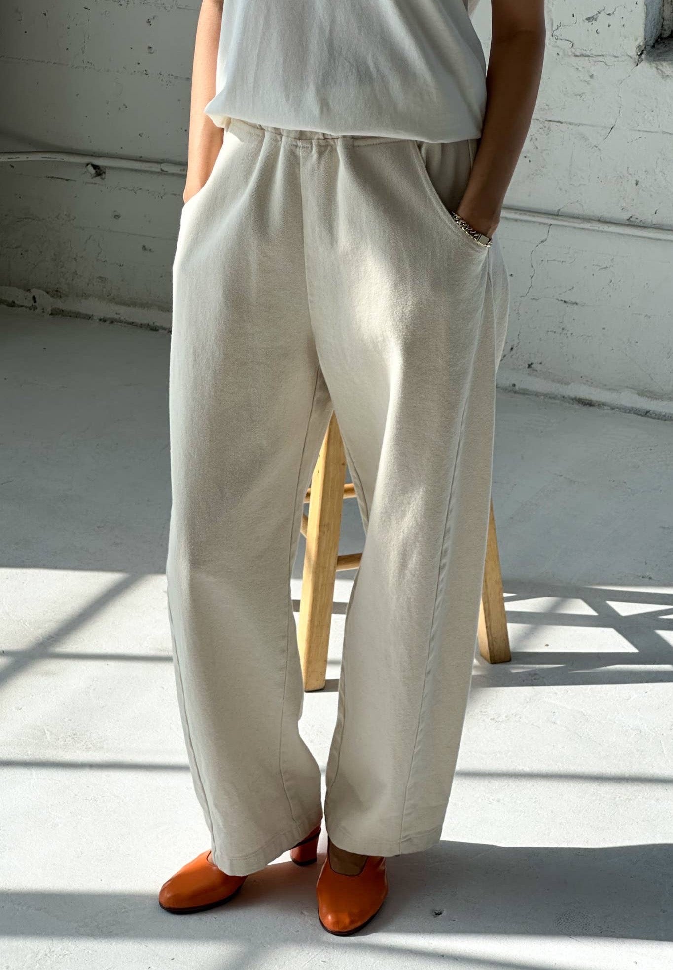Barrel leg Arc pants from Le Bon Shoppe. Slightly cropped wide leg, elastic waistband, deep pockets. Undyed cotton canvas, creamy off white colour.