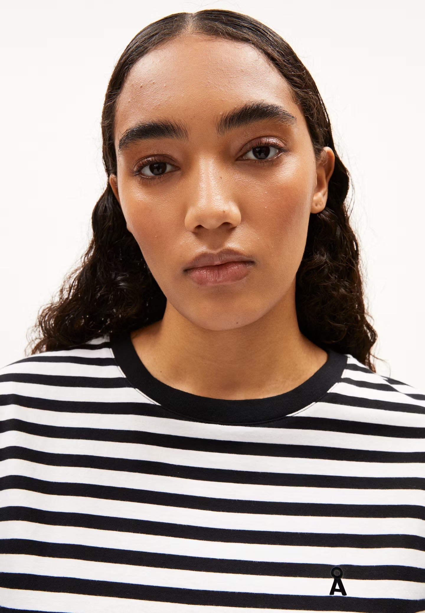 Cap sleeve t-shirt from Armedangels. Relaxed fit. Made from sustainable organic cotton. Black and white horizontal stripes.