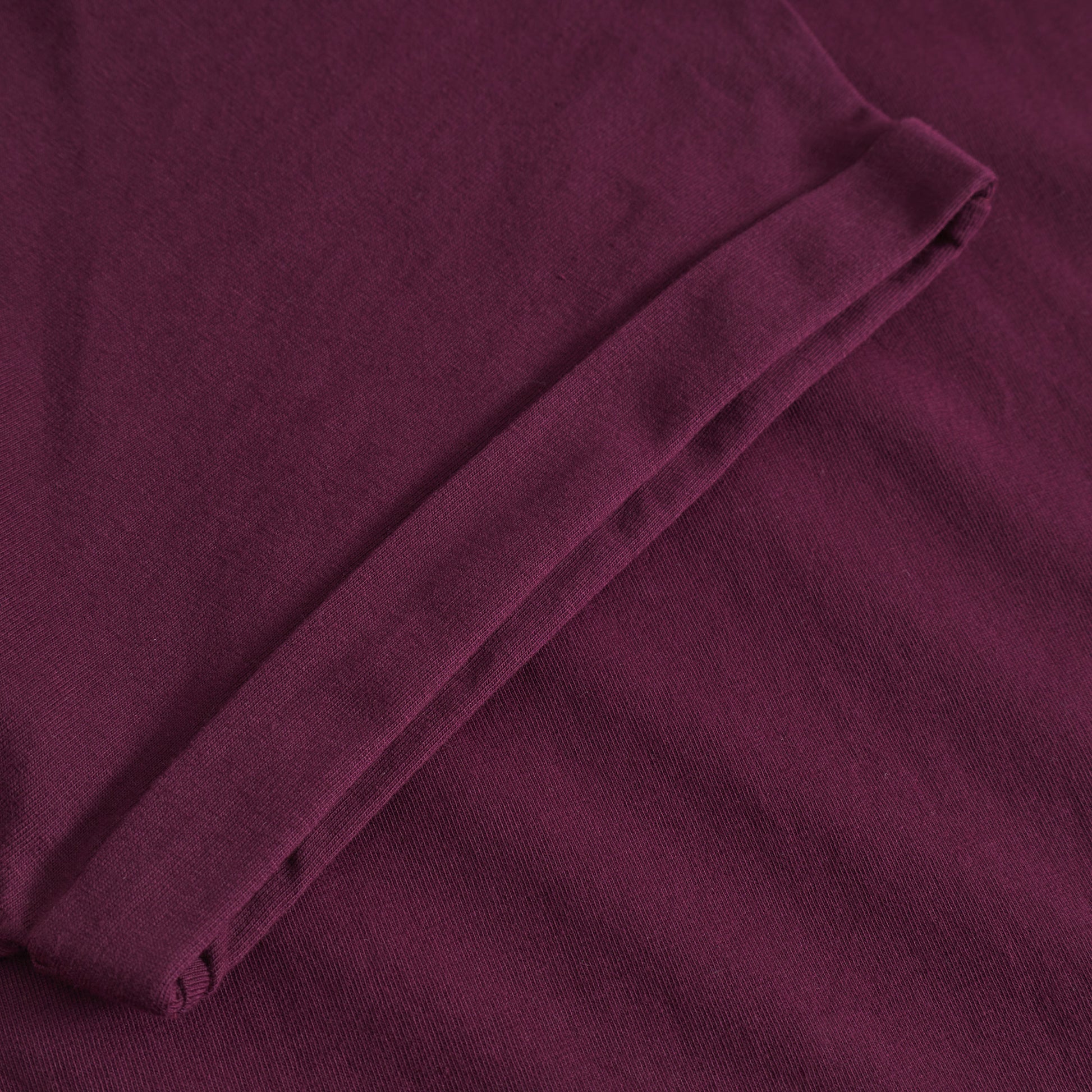 Close-up of a folded burgundy fabric