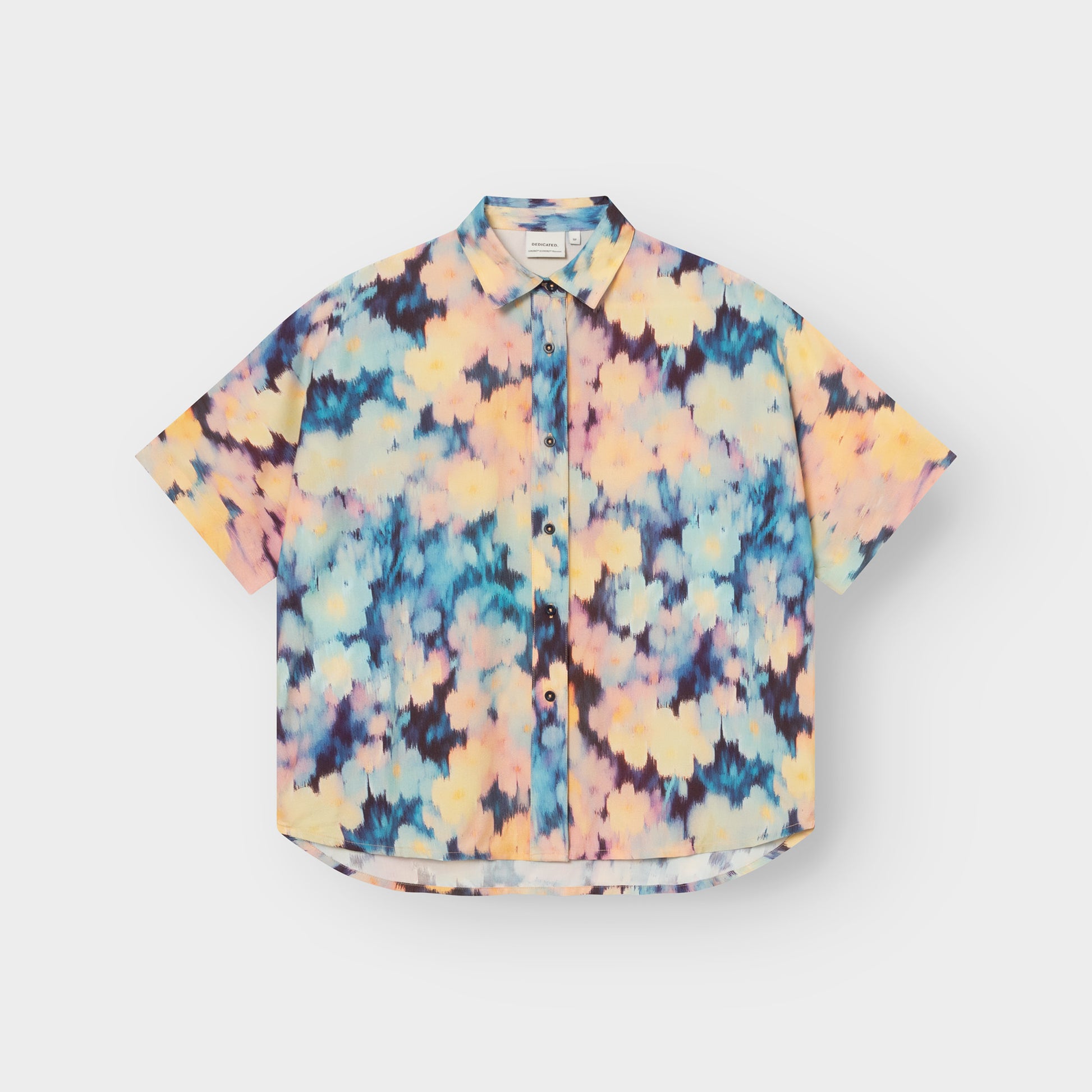 Short-sleeve shirt with a colorful tie-dye pattern on a white background
