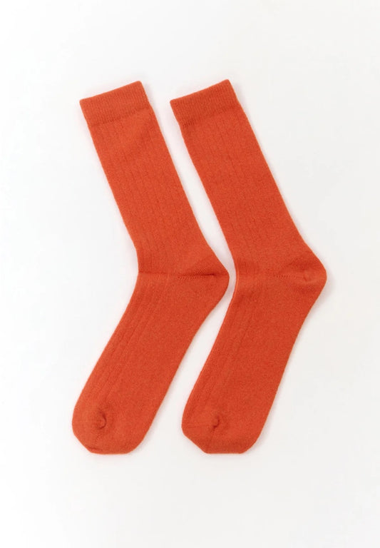 Orange wool blend socks from the Spanish brand Suite13Lab. Made from 70% merino wool, 27% polyamide, 3% elastomer. Made in Spain.