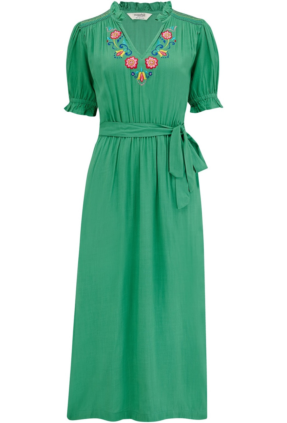 Boho style summer midi dress from SUGARHILL BRIGHTON in a vibrant shade of green. It has a relaxed cut and comes with a self-fabric belt, short sleeves with shirred frill cuffs, shirring on the shoulders, a flattering V-neck adorned with delicate floral embroidery.l and pockets.